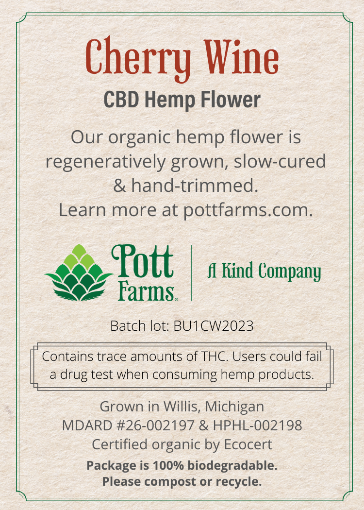 back label of packaging stating our organic hemp flower is regeneratively grown, slow-cured, and hand trimmed, with lot and license numbers